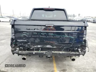 2025 Honda Ridgeline RTL with VIN 5FPYK3F52SB014785, listed as a Copart auction lot 59982875 with 2,341 mi miles and Salvage title. Bid and sale history available at DreamBid. Image 6.