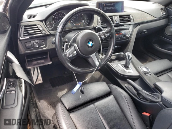 2014 BMW 4 Series 435i xDrive with VIN WBA3R5C59EK187836, listed as a Copart auction lot 63946075 with 100,700 mi miles and Salvage title. Bid and sale history available at DreamBid. Image 8.