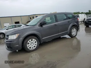 2015 Dodge Journey American Value with VIN 3C4PDCAB2FT712025, listed as a Copart auction lot 55733985 with 124,118 mi miles and Clean Title. Bid and sale history available at DreamBid. Image 1.