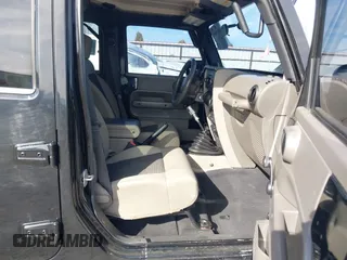 2009 Jeep Wrangler Unlimited X with VIN 1J4GA391X9L701403, listed as a IAAI auction lot 41890659 with 143,619 mi miles. Bid and sale history available at carsss.com. Image 5.