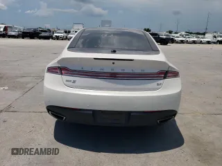 2016 Lincoln MKZ z VIN 3LN6L2GK0GR615898, wystawiony jako Copart lot #62814285 z przebiegiem 231 270 mil mil oraz Szkoda całkowita • Salvage title. Historia ofert i sprzedaży dostępna na DreamBid. Obrazek 6.