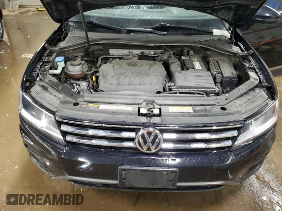 2021 Volkswagen Tiguan SE z VIN 3VV2B7AX1MM001377, wystawiony jako Copart lot #49893775 z przebiegiem 61 422 mil mil oraz Szkoda całkowita • Salvage title. Historia ofert i sprzedaży dostępna na DreamBid. Obrazek 11.