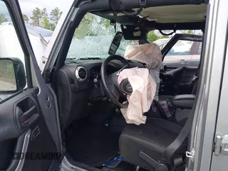 2016 Jeep Wrangler Unlimited Sahara with VIN 1C4BJWEG3GL240859, listed as a IAAI auction lot 42628937 with 103,378 mi miles and . Bid and sale history available at DreamBid. Image 5.