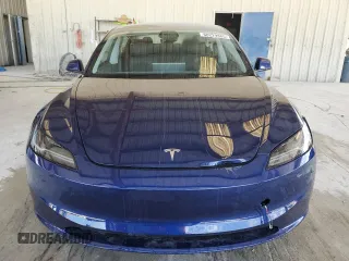 2025 Tesla Model 3 Long Range with VIN 5YJ3E1EBXSF941345, listed as a Copart auction lot 60229865 with 1,711 mi miles and Salvage title. Bid and sale history available at DreamBid. Image 5.