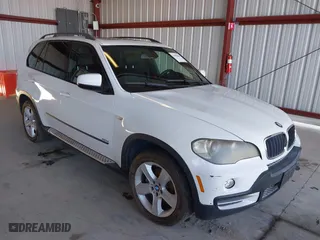 2007 BMW X5 3.0si with VIN 5UXFE43507L018015, listed as a IAAI auction lot 41880668 with 150,329 mi miles. Bid and sale history available at carsss.com. Image 1.