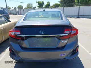 2018 Honda Clarity Touring z VIN JHMZC5F33JC021811, wystawiony jako IAAI lot #42272808 z przebiegiem 82 414 mil mil oraz . Historia ofert i sprzedaży dostępna na DreamBid. Obrazek 16.