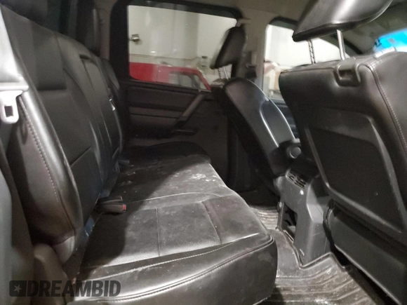 2012 Nissan Titan SV with VIN 1N6BA0EC6CN321585, listed as a Copart auction lot 80860004 with 141,092 mi miles and Salvage Title. Bid and sale history available at carsss.com. Image 10.