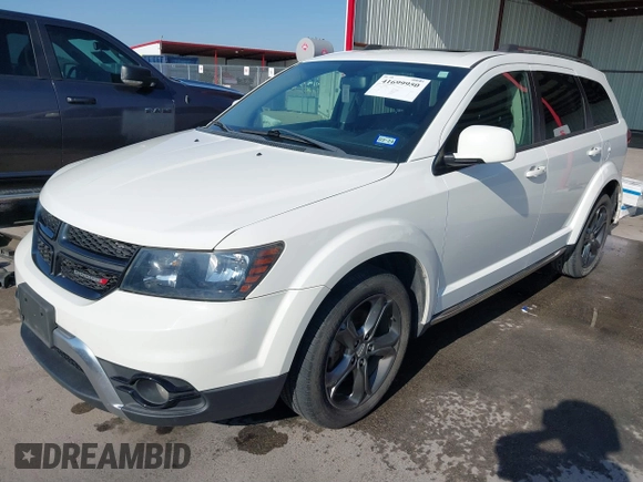 2016 Dodge Journey Crossroad Plus z VIN 3C4PDCGB1GT123668, wystawiony jako IAAI lot #41699950 z przebiegiem 91 410 mil mil oraz . Historia ofert i sprzedaży dostępna na DreamBid. Obrazek 19.