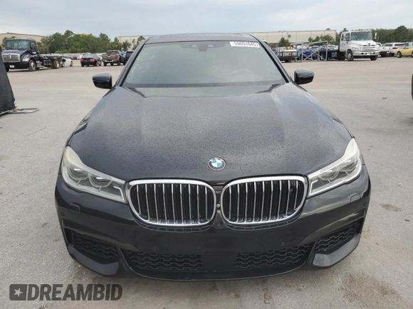 2016 BMW 7 Series 750i with VIN WBA7F0C56GGL99533, listed as a Copart auction lot 59091045 with 124,624 mi miles and Clean title. Bid and sale history available at DreamBid. Image 5.