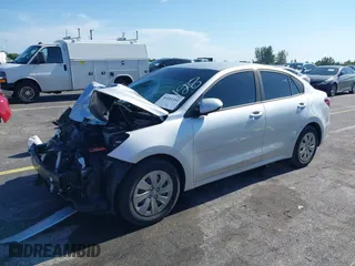2018 Kia Rio LX with VIN 3KPA24AB0JE054428, listed as a IAAI auction lot 40101162 with 107,857 mi miles. Bid and sale history available at carsss.com. Image 2.