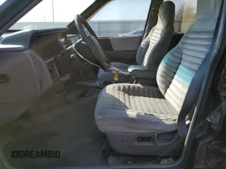 1993 Jeep Grand Cherokee Laredo with VIN 1J4GZ58S8PC656490, listed as a Copart auction lot 49377485 with 236,215 mi miles and Salvage Title. Bid and sale history available at carsss.com. Image 7.