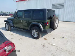 2023 Jeep Wrangler Willys with VIN 1C4HJXDG7PW646627, listed as a IAAI auction lot 42469601 with 50,178 mi miles and . Bid and sale history available at DreamBid. Image 3.