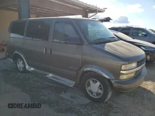 1999 Chevrolet Astro Cargo YF7 with VIN 1GBDM19W2XB174951, listed as a Copart auction lot 76009344 with 131,554 mi miles and Salvage Title. Bid and sale history available at carsss.com. Image 4.
