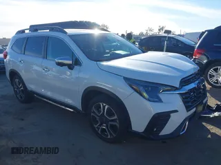 2023 Subaru Ascent Touring z VIN 4S4WMAWD0P3440593, wystawiony jako IAAI lot #41383633 z przebiegiem 7 958 mil mil oraz . Historia ofert i sprzedaży dostępna na DreamBid. Obrazek 1.