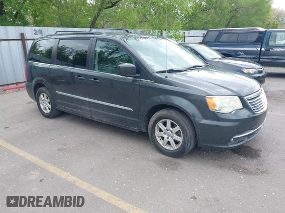 2012 Chrysler Town & Country Touring with VIN 2C4RC1BG1CR312532, listed as a IAAI auction lot 42194864 with 197,609 mi miles and . Bid and sale history available at DreamBid. Image 1.
