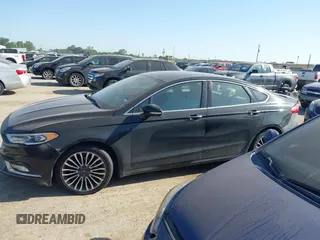 2017 Ford Fusion Titanium with VIN 3FA6P0K9XHR118057, listed as a IAAI auction lot 41982261 with 151,704 mi miles. Bid and sale history available at carsss.com. Image 14.
