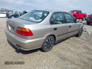 2000 Honda Civic LX with VIN 1HGEJ6574YL029220, listed as a IAAI auction lot 41669636 with 248,232 mi miles and . Bid and sale history available at carsss.com. Image 4.