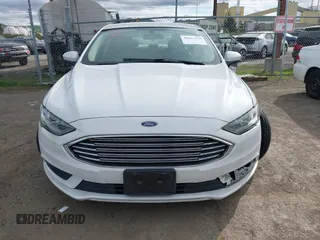 2018 Ford Fusion SE z VIN 3FA6P0LU5JR188171, wystawiony jako IAAI lot #41632358 z przebiegiem 73 677 mil mil oraz . Historia ofert i sprzedaży dostępna na DreamBid. Obrazek 12.