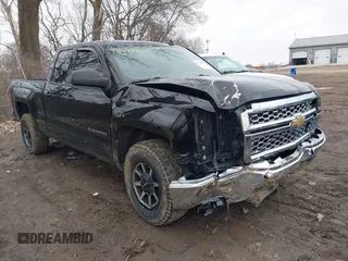 2014 Chevrolet Silverado 1500 LT with VIN 1GCRCRECXEZ373328, listed as a IAAI auction lot 41748737 with 117,439 mi miles and . Bid and sale history available at DreamBid. Image 1.