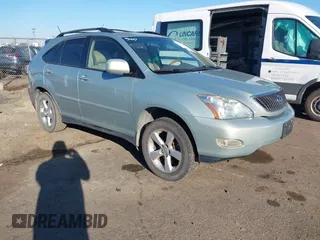 2006 Lexus RX 330 with VIN JTJGA31U260059684, listed as a IAAI auction lot 41872118 with 202,898 mi miles. Bid and sale history available at carsss.com. Image 1.
