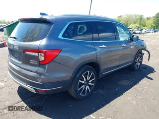 2021 Honda Pilot Touring 8-Passenger z VIN 5FNYF6H9XMB059037, wystawiony jako IAAI lot #42202410 z przebiegiem 49 267 mil mil oraz . Historia ofert i sprzedaży dostępna na DreamBid. Obrazek 4.