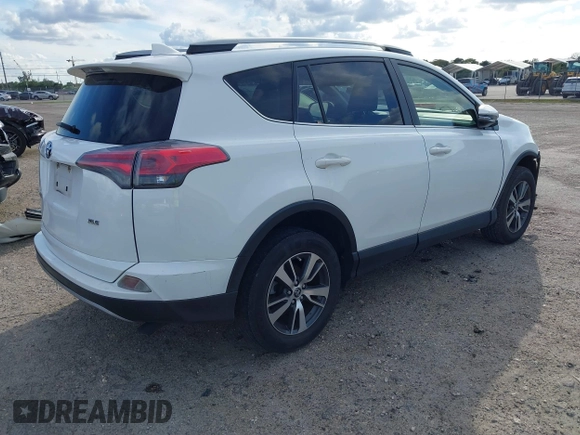 2018 Toyota RAV4 XLE with VIN JTMWFREV7JJ174483, listed as a IAAI auction lot 41597797 with 82,836 mi miles. Bid and sale history available at carsss.com. Image 4.