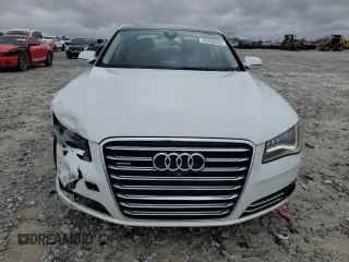 2014 Audi A8 3.0T z VIN WAURGAFD3EN003758, wystawiony jako Copart lot #47636885 z przebiegiem 166 990 mil mil oraz Szkody całkowita. Historia ofert i sprzedaży dostępna na DreamBid. Obrazek 5.