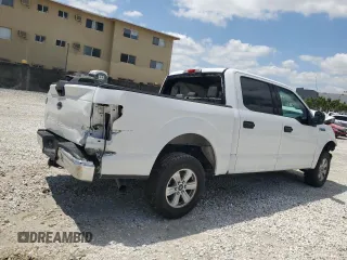 2019 Ford F-150 XL with VIN 1FTEW1C44KFA19563, listed as a Copart auction lot 52402655 with 147,071 mi miles and Non Repairable. Bid and sale history available at DreamBid. Image 3.