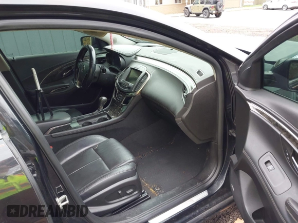 2014 Buick LaCrosse Premium II with VIN 1G4GF5G39EF172201, listed as a IAAI auction lot 41963281 with 106,231 mi miles and . Bid and sale history available at DreamBid. Image 5.