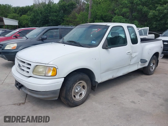 2003 Ford F-150 XL with VIN 1FTRX07263KD53880, listed as a IAAI auction lot 42422353 with 192,630 mi miles and . Bid and sale history available at DreamBid. Image 2.