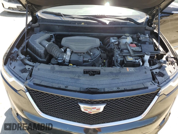 2023 Cadillac XT6 AWD Sport z VIN 1GYKPGRS2PZ130847, wystawiony jako Copart lot #58174474 z przebiegiem 11 958 mil mil oraz Tytuł czysty. Historia ofert i sprzedaży dostępna na DreamBid. Obrazek 12.