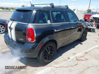 2012 MINI Countryman with VIN WMWZB3C51CWM05034, listed as a IAAI auction lot 42235437 with 131,280 mi miles and . Bid and sale history available at DreamBid. Image 4.