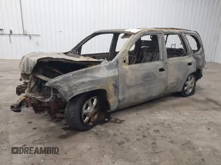 2005 GMC Envoy SLT z VIN 1GKDT13S752254350, wystawiony jako IAAI lot #41301432 z przebiegiem Nie podano mil oraz . Historia ofert i sprzedaży dostępna na DreamBid. Obrazek 17.