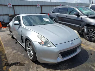 2011 Nissan 370Z Touring with VIN JN1AZ4EH4BM554978, listed as a IAAI auction lot 42167613 with 229,176 mi miles and . Bid and sale history available at DreamBid. Image 1.