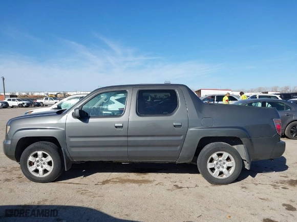 2007 Honda Ridgeline RTL w/Leather with VIN 2HJYK16547H526249, listed as a IAAI auction lot 41769625 with 173,168 mi miles. Bid and sale history available at carsss.com. Image 14.