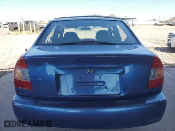 2002 Hyundai Accent GL with VIN KMHCG45C32U332833, listed as a Copart auction lot 66539644 with 69,763 mi miles and Salvage Title. Bid and sale history available at carsss.com. Image 6.