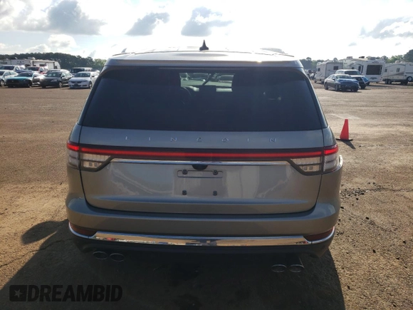2023 Lincoln Aviator Reserve with VIN 5LM5J7WC7PGL10427, listed as a Copart auction lot 52072055 with 51,265 mi miles and Salvage title. Bid and sale history available at DreamBid. Image 6.