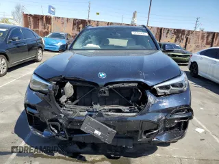 2023 BMW X5 xDrive45e with VIN 5UXTA6C06P9R89208, listed as a Copart auction lot 50352635 with 0 mi miles and Salvage Title. Bid and sale history available at carsss.com. Image 5.