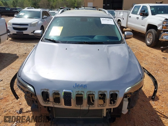 2019 Jeep Cherokee Latitude with VIN 1C4PJLCX7KD220799, listed as a IAAI auction lot 41970875 with 104,394 mi miles and . Bid and sale history available at DreamBid. Image 12.