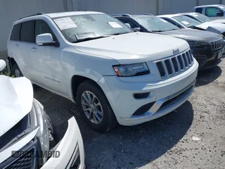 2015 Jeep Grand Cherokee Summit with VIN 1C4RJEJG5FC614708, listed as a IAAI auction lot 42121202 with 192,644 mi miles and . Bid and sale history available at DreamBid. Image 1.