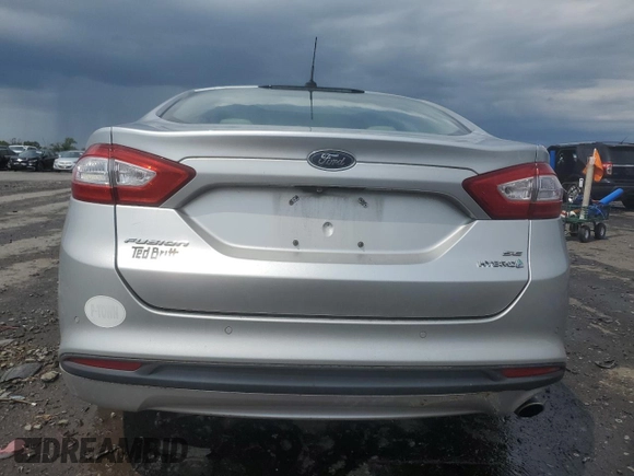 2013 Ford Fusion SE Hybrid с VIN 3FA6P0LU8DR240784, выставлен на аукционе Copart как лот 60202425 с пробегом 159 284 миль миль и Списание • Salvage title. История ставок и продаж доступна на DreamBid. Изображение 6.