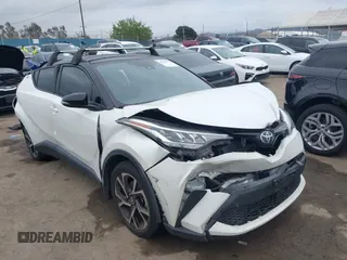 2020 Toyota C-HR LE with VIN JTNKHMBX9L1092934, listed as a IAAI auction lot 42021972 with 56,777 mi miles and . Bid and sale history available at DreamBid. Image 1.