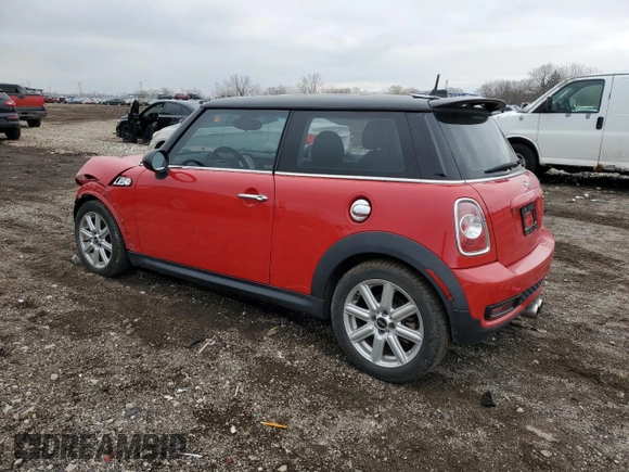 2012 MINI Hardtop S with VIN WMWSV3C59CT385254, listed as a Copart auction lot 52675675 with 76,250 mi miles and Salvage Title. Bid and sale history available at DreamBid. Image 2.