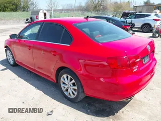 2013 Volkswagen Jetta SE with VIN 3VWDP7AJ8DM350439, listed as a IAAI auction lot 41957425 with 104,685 mi miles and . Bid and sale history available at DreamBid. Image 3.