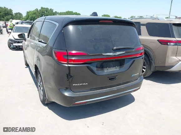 2023 Chrysler Pacifica Hybrid Touring L with VIN 2C4RC1L77PR540958, listed as a IAAI auction lot 42010484 with 61,166 mi miles. Bid and sale history available at carsss.com. Image 3.