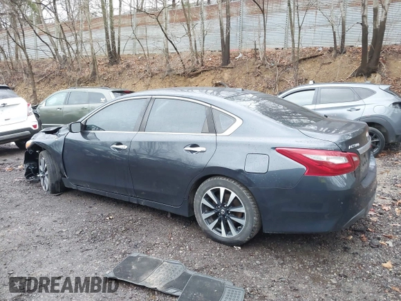 2018 Nissan Altima SV with VIN 1N4AL3AP3JC205875, listed as a IAAI auction lot 41892855 with 159,630 mi miles and . Bid and sale history available at DreamBid. Image 15.