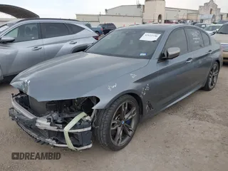 2018 BMW 5 Series M550i xDrive with VIN WBAJB9C55JB035694, listed as a IAAI auction lot 42122730 with 61,561 mi miles and . Bid and sale history available at DreamBid. Image 2.