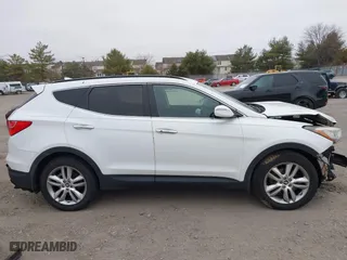 2013 Hyundai Santa Fe 2.0T Sport with VIN 5XYZUDLA9DG067638, listed as a IAAI auction lot 41781769 with 99,022 mi miles. Bid and sale history available at carsss.com. Image 13.