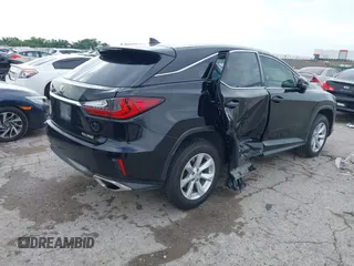 2016 Lexus RX 350 z VIN 2T2BZMCA4GC017342, wystawiony jako IAAI lot #42357093 z przebiegiem 142 515 mil mil oraz . Historia ofert i sprzedaży dostępna na DreamBid. Obrazek 4.