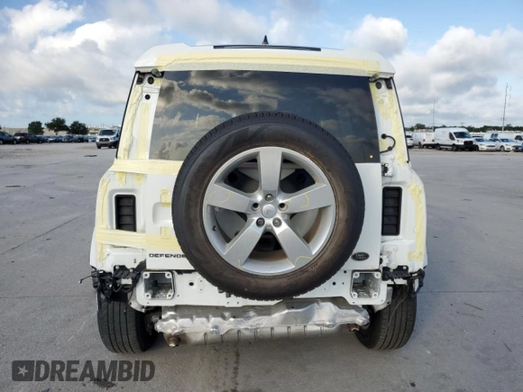 2023 Land Rover Defender S with VIN SALEJ7EXXP2124527, listed as a Copart auction lot 64578725 with 33,816 mi miles and Salvage title. Bid and sale history available at DreamBid. Image 6.